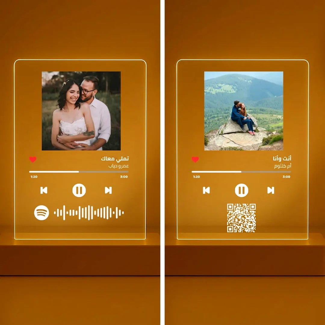Two Arabic MusicGlass night light panels side by side, one with a Spotify scan code and one with a QR code